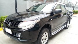 Selling Black Mitsubishi Strada 2017 in San Pedro