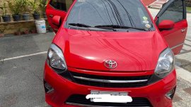 Selling Red Toyota Wigo 2016 in Quezon City