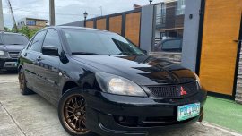 Selling Black Mitsubishi Lancer 2011 in Manila