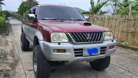 Red Mitsubishi Strada 2003 for sale in Manual