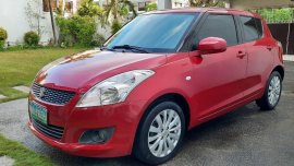 Sell Red 2011 Suzuki Swift in Parañaque