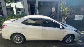 Pearl White Toyota Corolla Altis 2016 for sale in Quezon