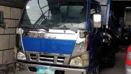 2013 isuzu elf minidump 4HF1 with AC good running condition