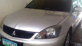 Sell Silver 2011 Mitsubishi Lancer in Bustos