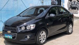 Black Chevrolet Sonic 2013 for sale in Samal