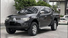 Black Mitsubishi Strada 2012 for sale in Jaen