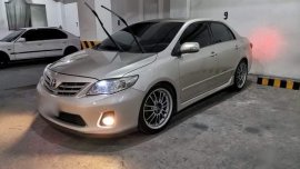 Selling Brightsilver Toyota Corolla Altis 2011 in Quezon