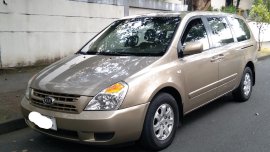 Beige Kia Carnival 2009 for sale in Subic