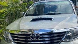 Brightsilver Toyota Fortuner 2013 for sale in Quezon