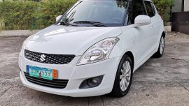 Pearl White Suzuki Swift 2013 for sale in Automatic