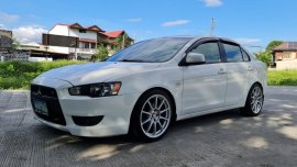 White Mitsubishi Lancer 2010 for sale in Muntinlupa 