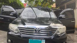 Selling Black Toyota Fortuner 2012 in Quezon City