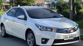 Pearl White Toyota Corolla Altis 2014 for sale in Calasiao