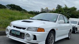 Selling White Mitsubishi Lancer 1996 in Muntinlupa