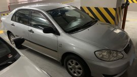 Selling Brightsilver Toyota Corolla Altis 2005 in Manila