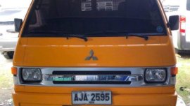 Yellow Mitsubishi L300 2015 for sale in Pasig