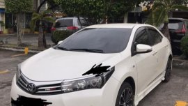 Selling Pearl White Toyota Corolla Altis 2015 in Bulacan