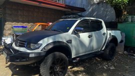 Sell White 2014 Mitsubishi Strada in Manila