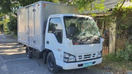 Pearl White Isuzu Nhr 2010 for sale in Manual