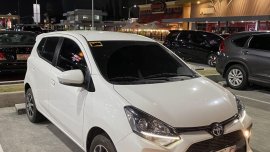 Selling White Toyota Wigo 2021 in Manila