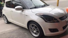 Pearl White Suzuki Swift 2015 for sale