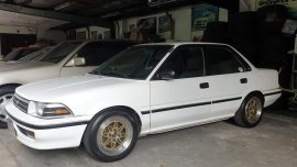 Selling Pearl White Toyota Corolla 1989 in Quezon