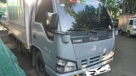 Grey Isuzu Nhr 2013 for sale in Manual