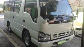 Selling White Isuzu NHR 2011 in Cavite