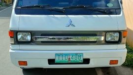 Sell White 2011 Mitsubishi L300 in Dagupan