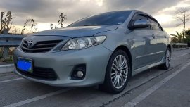 Pearl White Toyota Corolla Altis 2014 for sale in Maragondon