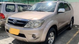 Pearl White Toyota Fortuner 2006 for sale in Balete 
