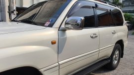 Pearl White Toyota Land Cruiser 2001 for sale in Quezon