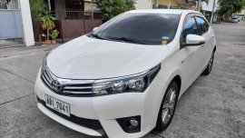 Selling Pearl White Toyota Corolla Altis 2015 in Angeles