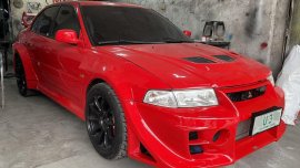 Selling Red Mitsubishi Lancer Evolution 1999 in Valenzuela