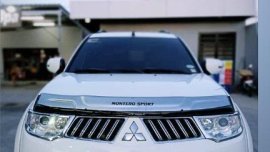 Pearl White Mitsubishi Montero sport 2013 for sale in Manila