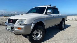 Selling Pearl White Mitsubishi L200 Strada 2003 in Manila