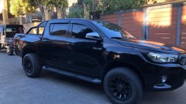 Black Toyota Hilux 2016 for sale in Talisay