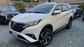 Selling Pearwhite Toyota Rush 2019 in Quezon City