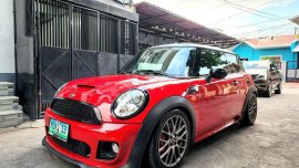 Red Mini Cooper 2011 for sale in Manual