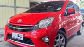 Selling Red Toyota Wigo 2016 in Quezon City
