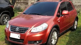 Red Suzuki SX4 2014 for sale in Quezon 