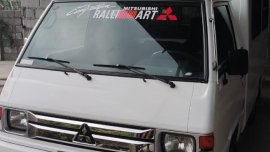 Selling White Mitsubishi L300 2018 in Marilao