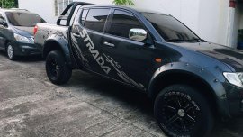 Selling Black Mitsubishi Strada 2009 in Manila