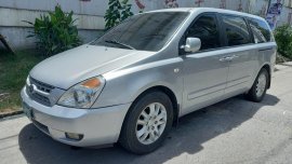 White Kia Carnival 2009 for sale in Manila