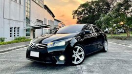 Sell Black 2014 Toyota Corolla altis in Quezon City