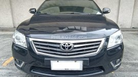 2010 Toyota Camry 2.4V (black) with 19" mags