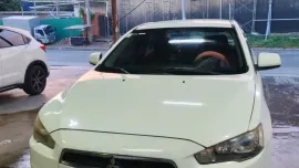 Selling White 2010 Mitsubishi Lancer Ex 