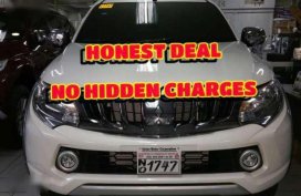2017 Mitsubishi Strada GLS 4x2 Manual Diesel Versus hilux navara 2016
