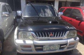 Mitsubishi strada 2004 4x4