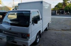 Mitsubishi L300 closed van model 2004